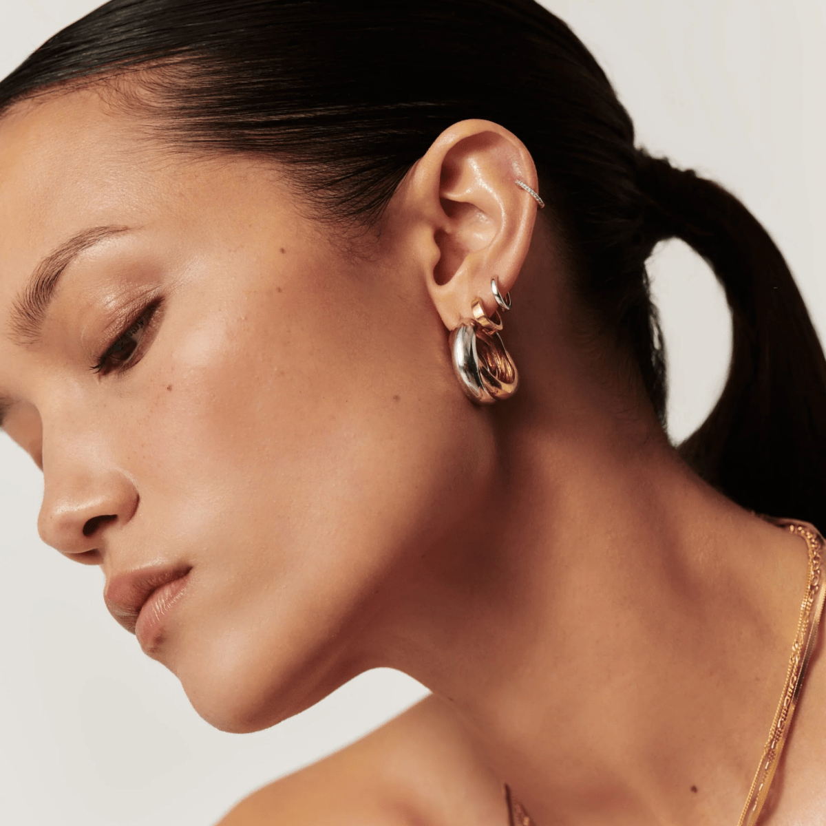 Lucy Williams Two-Tone Crossover Hoop Earrings