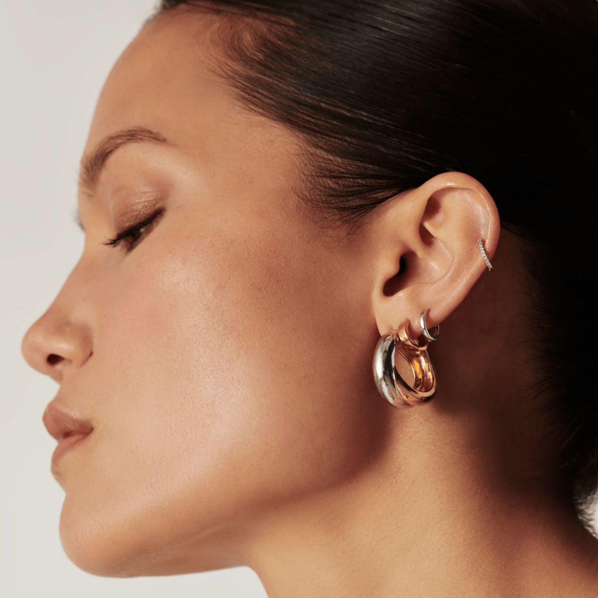 Lucy Williams Two-Tone Crossover Hoop Earrings