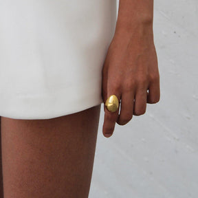 18K Gold Plated Ovoid Shaped Minimal Handmade Ring Paired With White Skirt - Tanzire