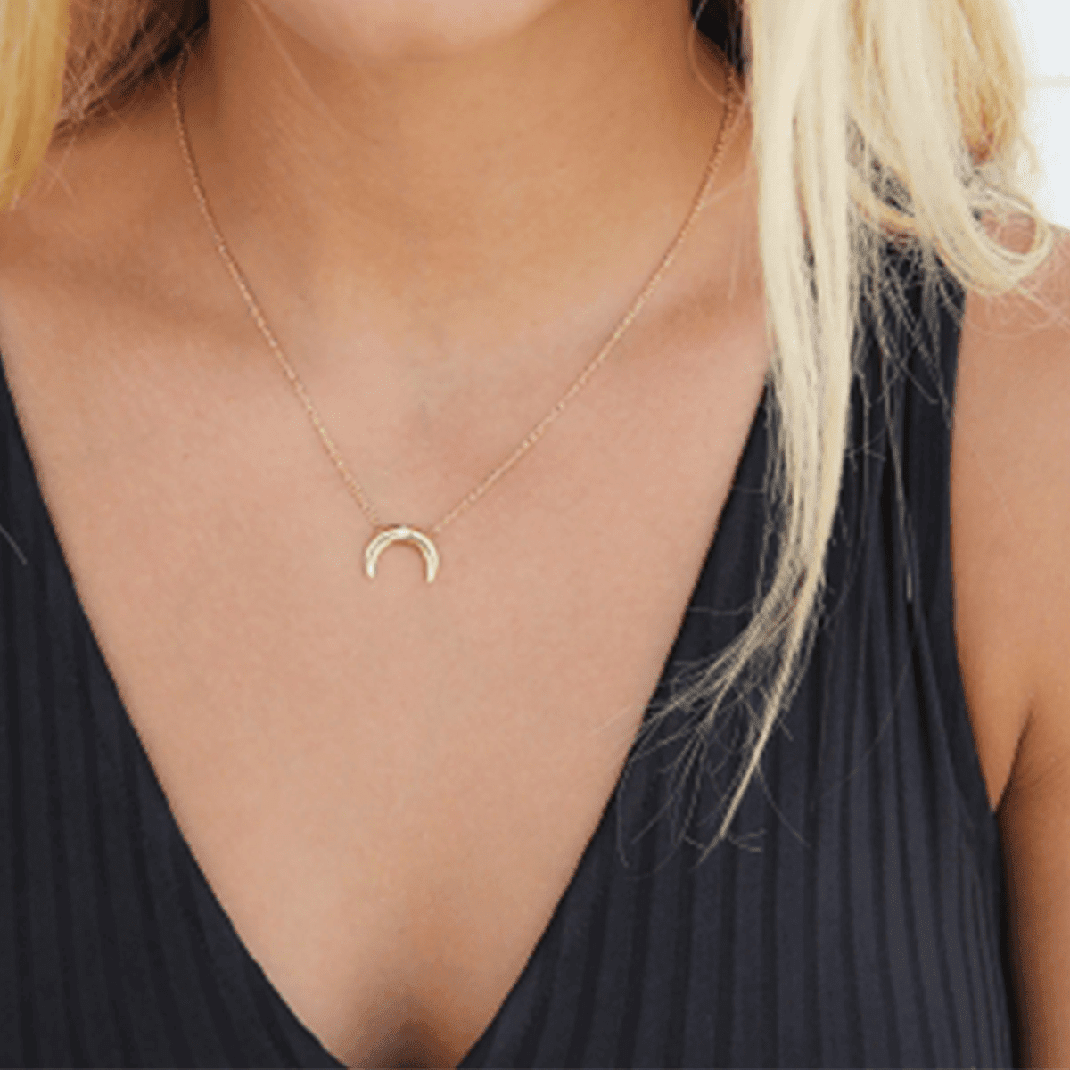 Model wearing 18k gold plated crescent moon minimal pendant chain - Tanzire