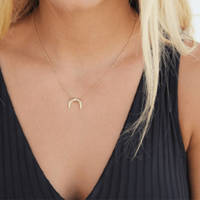 Model wearing 18k gold plated crescent moon minimal pendant chain - Tanzire