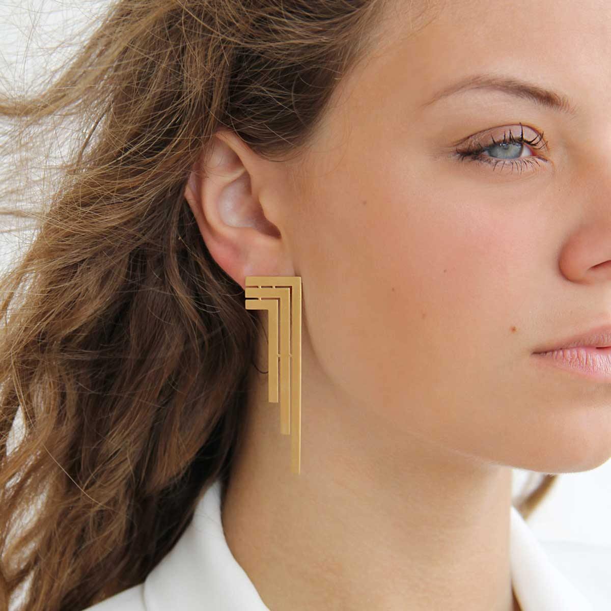 Dangle and Drop Three Line 18k Gold Plated Earrings On Model